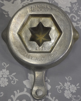 Base of Wagner Ware cast aluminium juicer