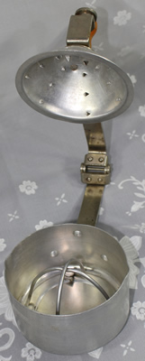 An open KNAPP's ORANGE JUICER aluminium juicer with crank handle