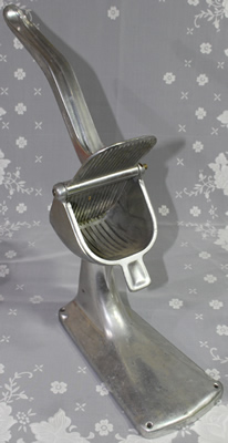 An open Simplex-Super 2 part large bench aluminum lever juicer 