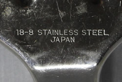 The incised mark on stainless steel wedge squeezer