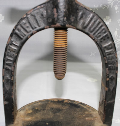 The embossing on a H F Osborne screw meat juice press