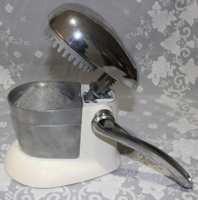 The parts of a lever iron white Juice-O-Mat squeezer juicer