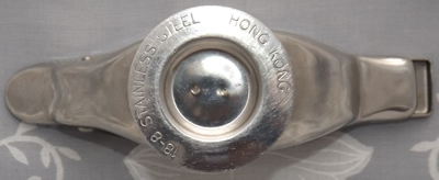 Incised marks on a Hong Kong stainless steel bird wedge juicer