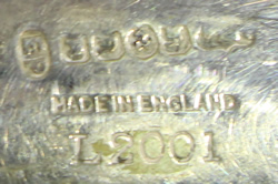 Hallmark on a James Dixon and Sons silver plate juicer