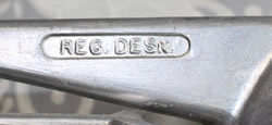 Embossed "REG. DESN." on a GUSSCOTT cast aluminium juicer 