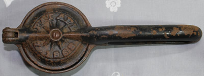 Cast iron showing ceramic juicer