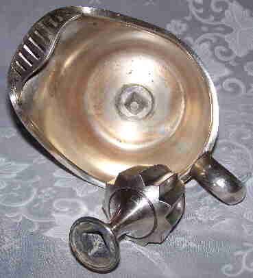 2 parts of a WM ROGERS or Meriden silver plate juicer