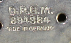 ll mark on parts of a DRGM GERMANY stainless steel cocktail shaker with juicer