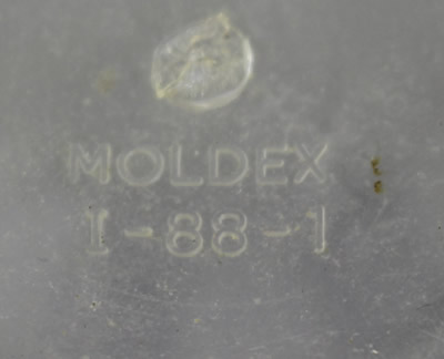 The branding plastic Moldex Australia juicer on clear base 