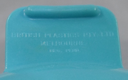 Pale blue British Plastic saucer juicer embossed tab handle