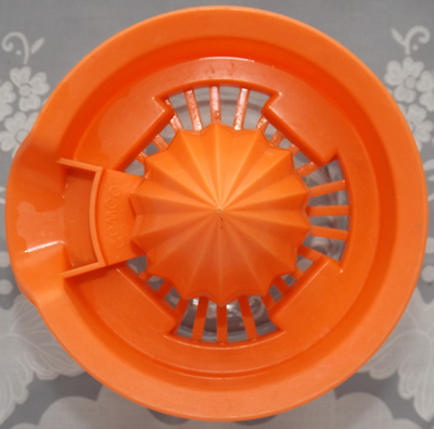 Orange Gemco 2 piece juicer top view