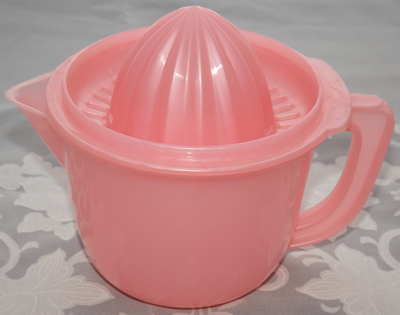 Pink 3 piece plastic juicer open