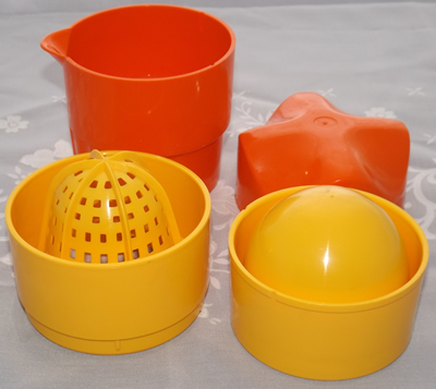 Orange and yellow 4 piece plastic juicer