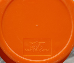 Orange and yellow 4 piece plastic juicer base