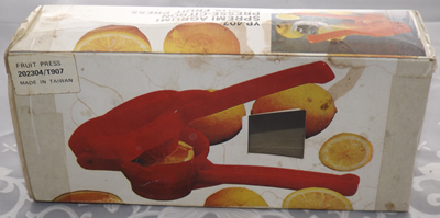 Light cream plastic hand held lever juicer box