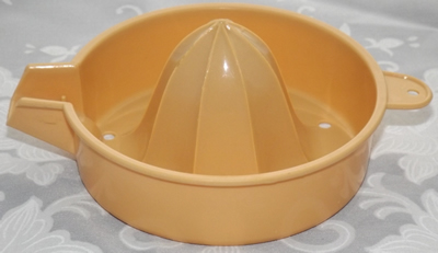 Very tall tan 2 piece plastic juicer top
