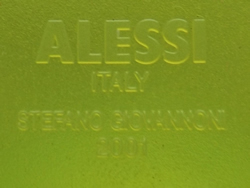 The embossed brand on the yellow Alessi 'Mandarin' juicer 