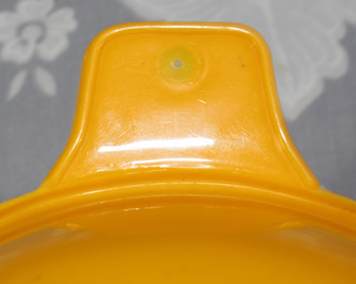 Showing handle type for an orange Associated Plastics juicer