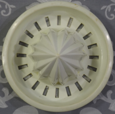 Lime green and white 2 piece plastic juicer