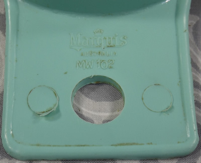 Embossed label on Grey green Marquis plastic juicer