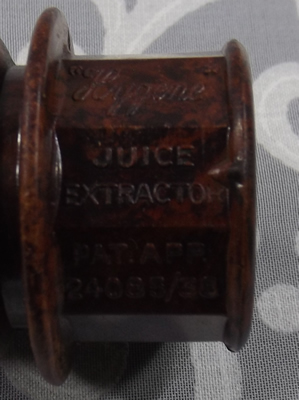 Green and brown bakelite Hygene juice extractors