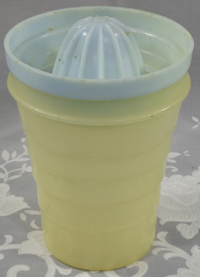 Cream and blue Ferolux Gyro Mixer showing plastic juicer