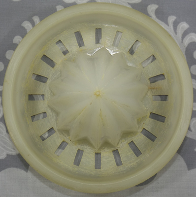 Top view Translucent plastic juicer reamer
