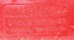 Logo on Red Lustro' Ware plastic juicer