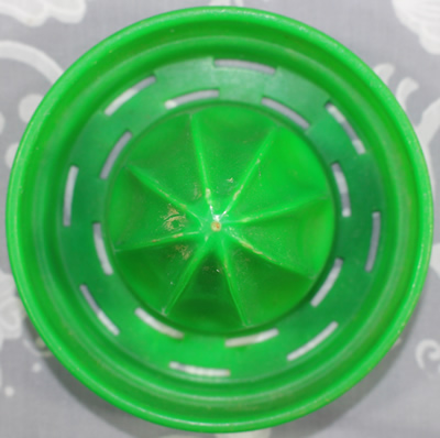 Green and white 2 piece plastic reamer