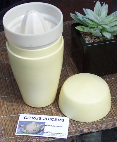 3 parts of Cream and white plastic cocktail shaker with juicer