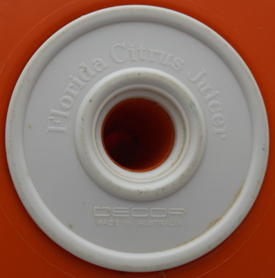 Base of Florida red & white plastic juicer