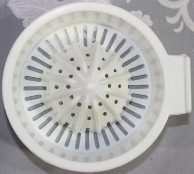 The reamer for a 2 piece white and translucent plastic juicer