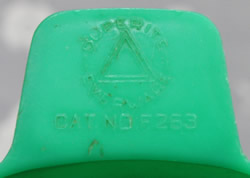 The branding on a green Duperite Everware saucer juicer