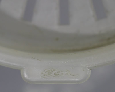 Eon logo on a translucent white juicer top