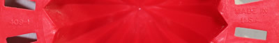 Marks on a crimson red reamer for Tupperware bowl
