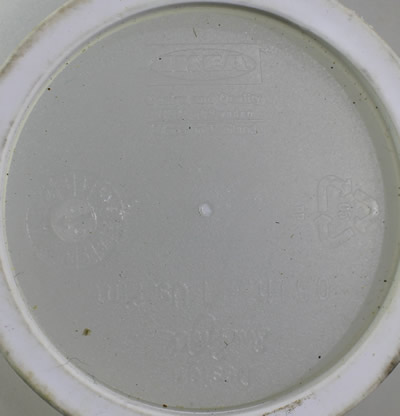 Brand on a 2 piece Ikea translucent white plastic juicer 