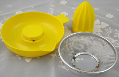 Yellow hard plastic juicer 3 parts