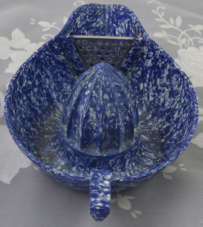Mottled dark blue & white bakelite juicer showing strainer