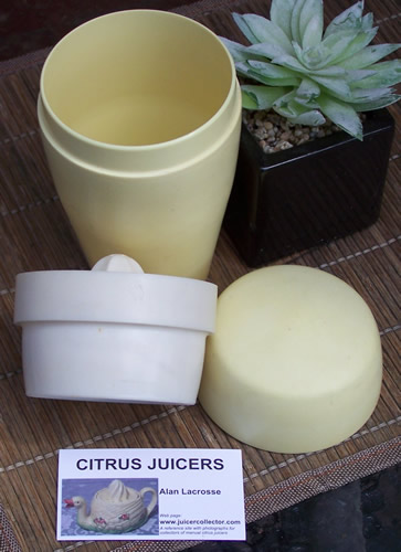 Parts of a complete cream & white Australian cocktail shaker