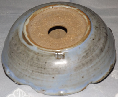 Makers mark Pale grey pottery juicer