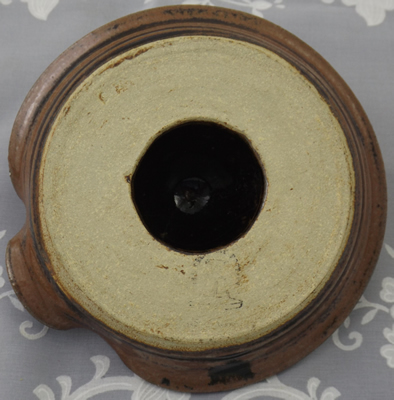 Brown & black hand made pottery juicer base