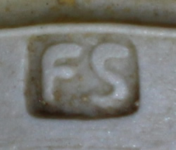 Fergus Stewart potter's mark on tan mushroom cone pottery juicer