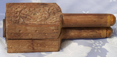 Carvings on wood squeezer juicer