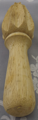 Showing rounded handle wood reamer juicer