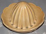 Dull yellow Carlton Ware juicer top