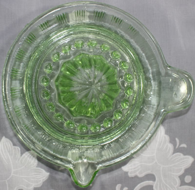 Top view of a Crown Crystal Glass Type 4 green glass juicer