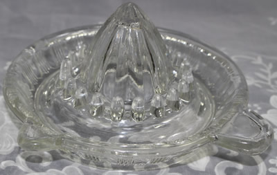 A Crown Crystal Glass Type 1 clear glass juicer