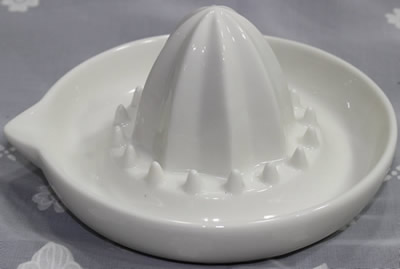 Rubber feet on a white ceramic juicer