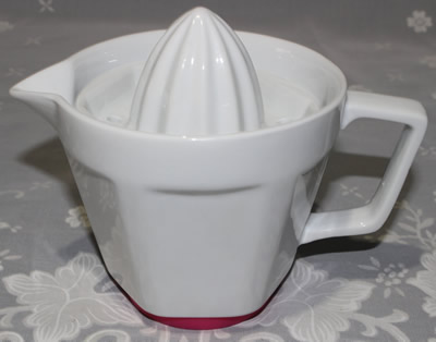 Hexagonal pattern on a white ceramic 2 piece juicer
