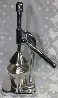 A heavy stainless steel lever squeezer
